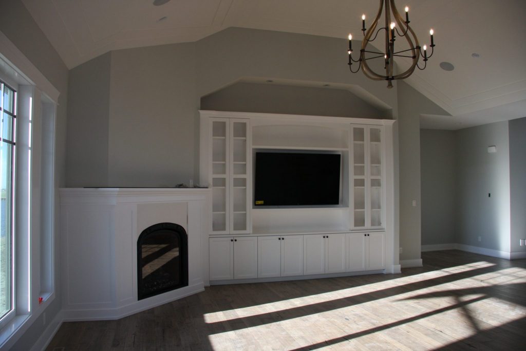 Living Room Project with custom fireplace and cabinets